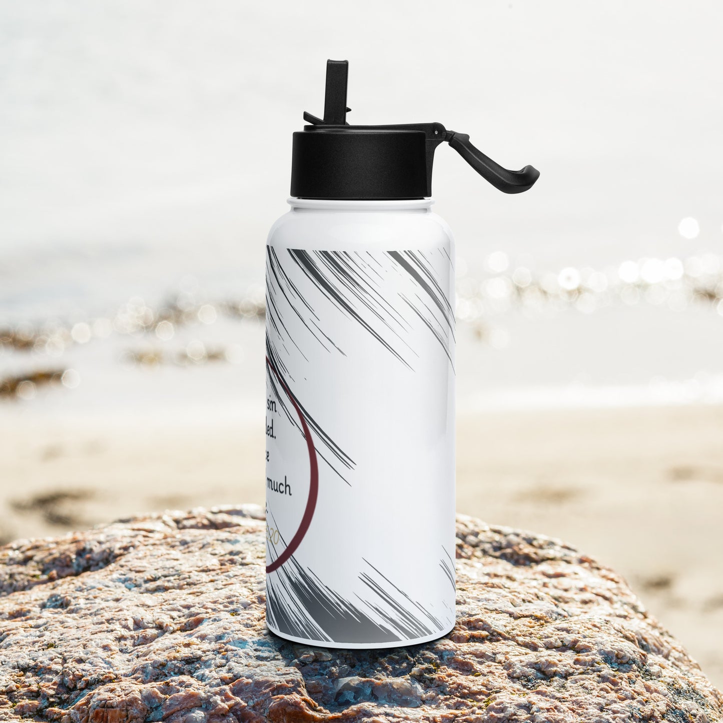 Stainless steel water bottle with a straw lid